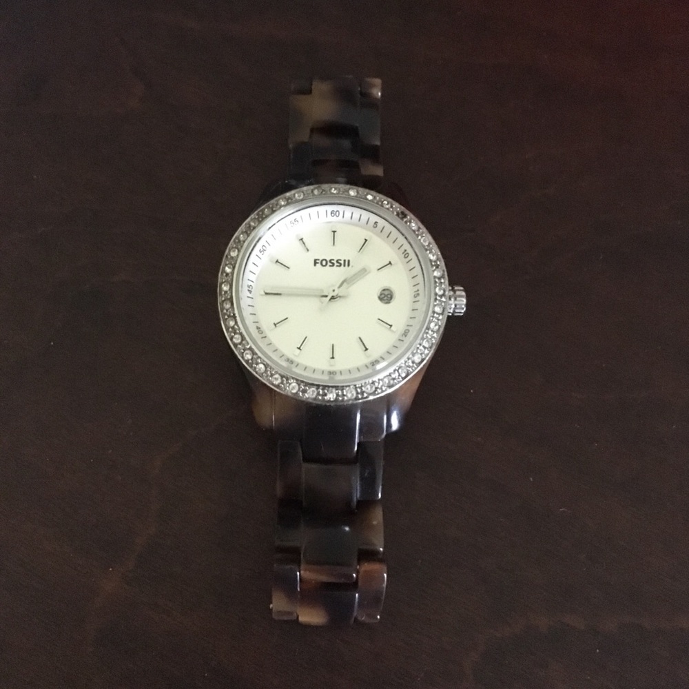 Fossil tortoise and silver watch